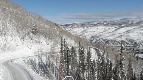 Thumb winding road in the snow 1250583