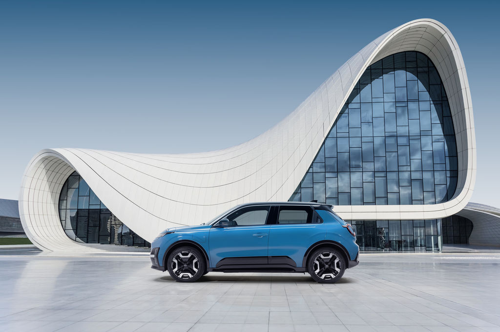 Content hero image of gear blue micra profile against a design architectural building