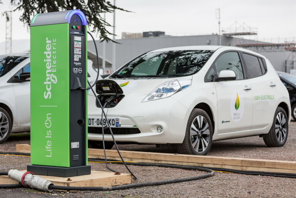 Content a nissan leaf recharging at one of the 90 charging