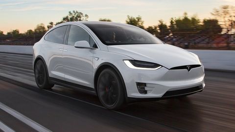 Thumb tesla model x p90d front three quarter in motion