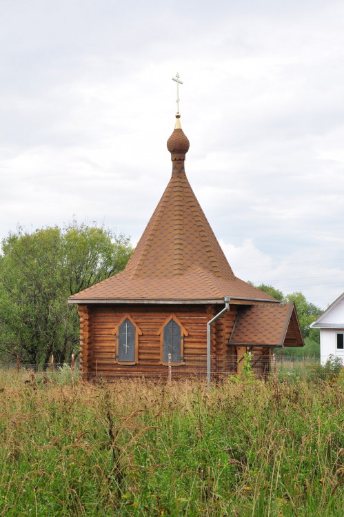 Акманай деревянная часовня часовая