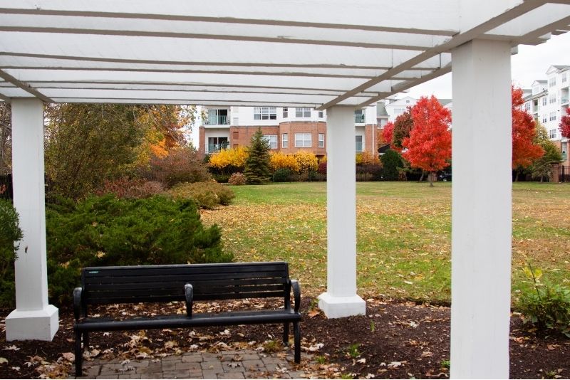pergola with roof attached to house