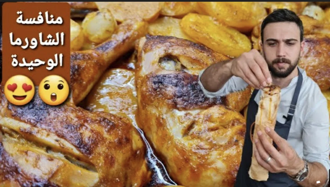 Tray of chicken with potatoes in the oven