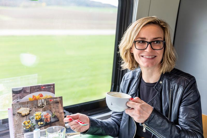 SBB Tageskarten Reisende im Zug