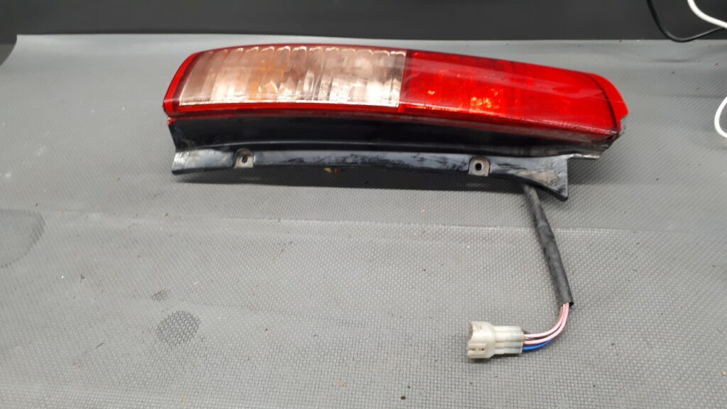 Lampa lewy tyl Tata Indigo Marina