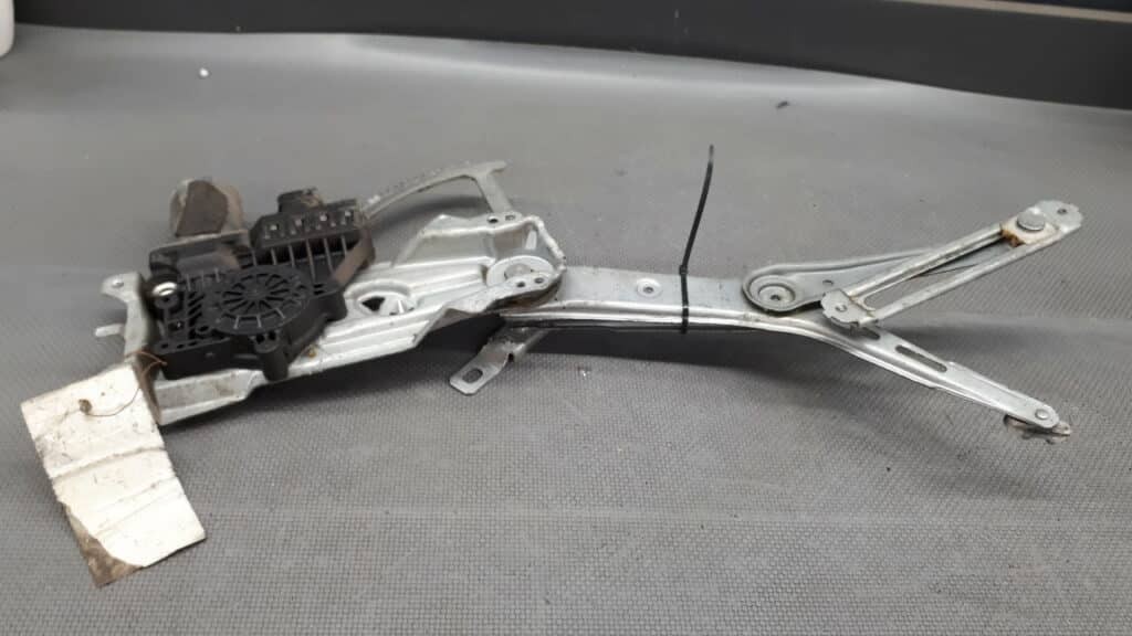 90521875 Mechanizm szyby lewy przod Opel Astra G 02r