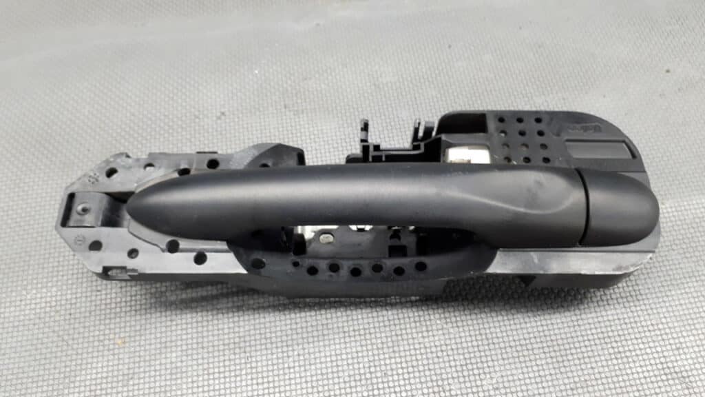 806060041R Klamka prawy tyl Renault Megane III CZARNA