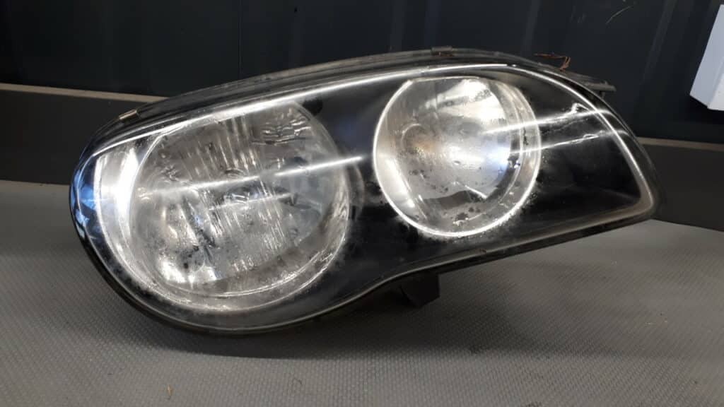 100-77126 Reflektor prawy TOYOTA COROLLA E11 LIFT
