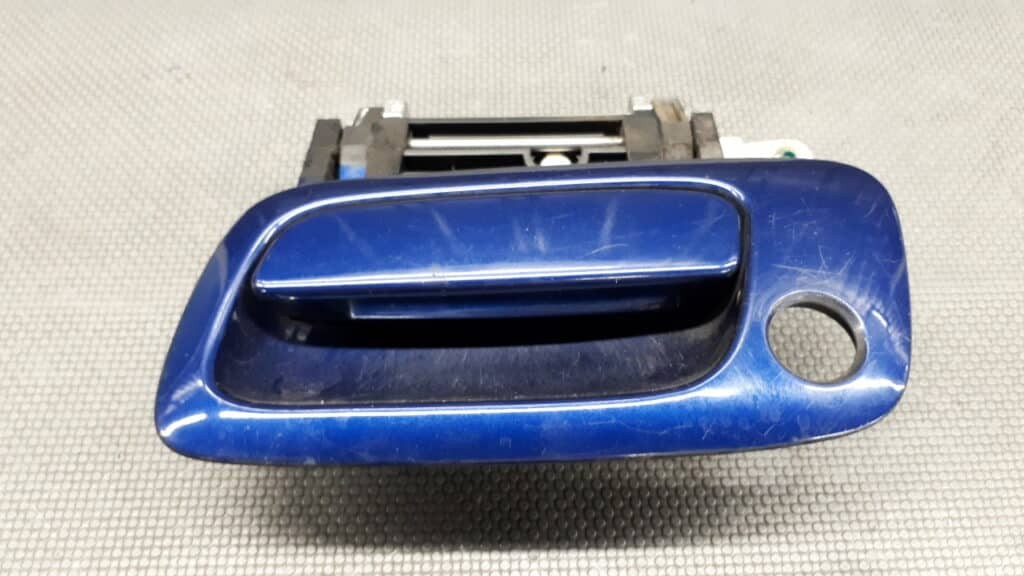 260933585 Klamka lewy przod Opel Zafira A NIEBIESKA