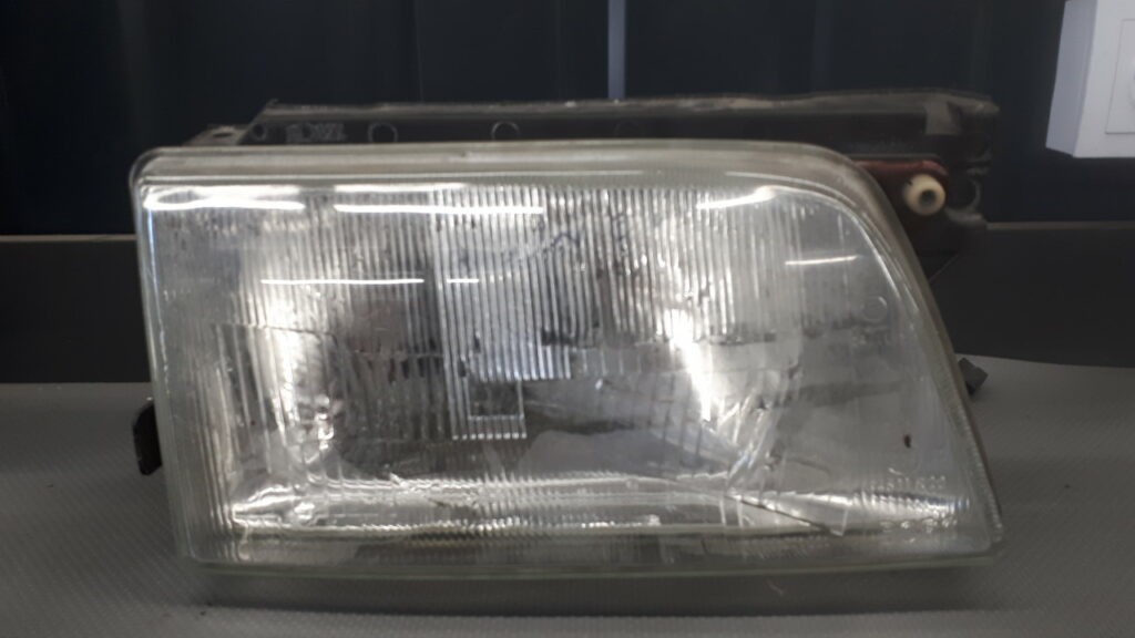 1305621031 Reflektor prawy OPEL KADETT E