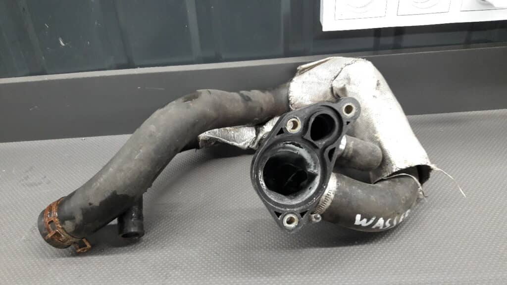 04792612AB Obudowa termostatu Chrysler Sebring 2,7 01-10r