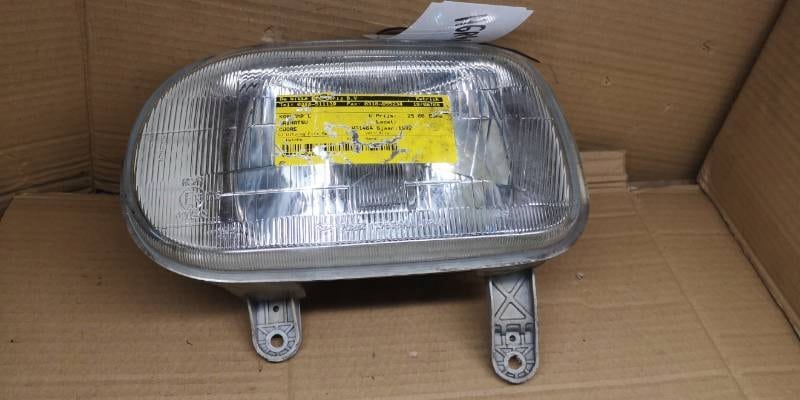 110-51289L REFLEKTOR LEWY DAIHATSU CUORE 92R
