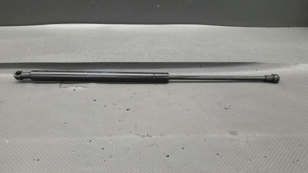 7700430022 silownik klapy Renault Scenic I