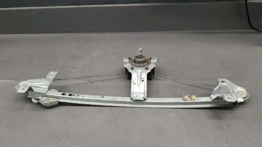 90306053 Mechanizm szyby lewy tył Opel Vectra A