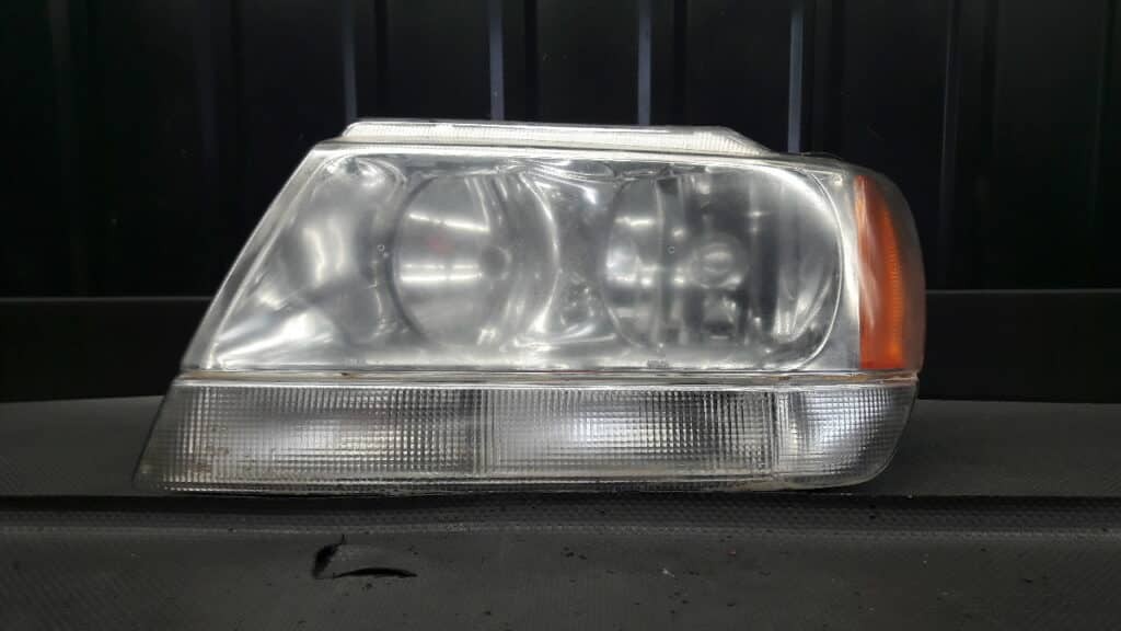 reflektor lewy przod Jeep grand cherokee