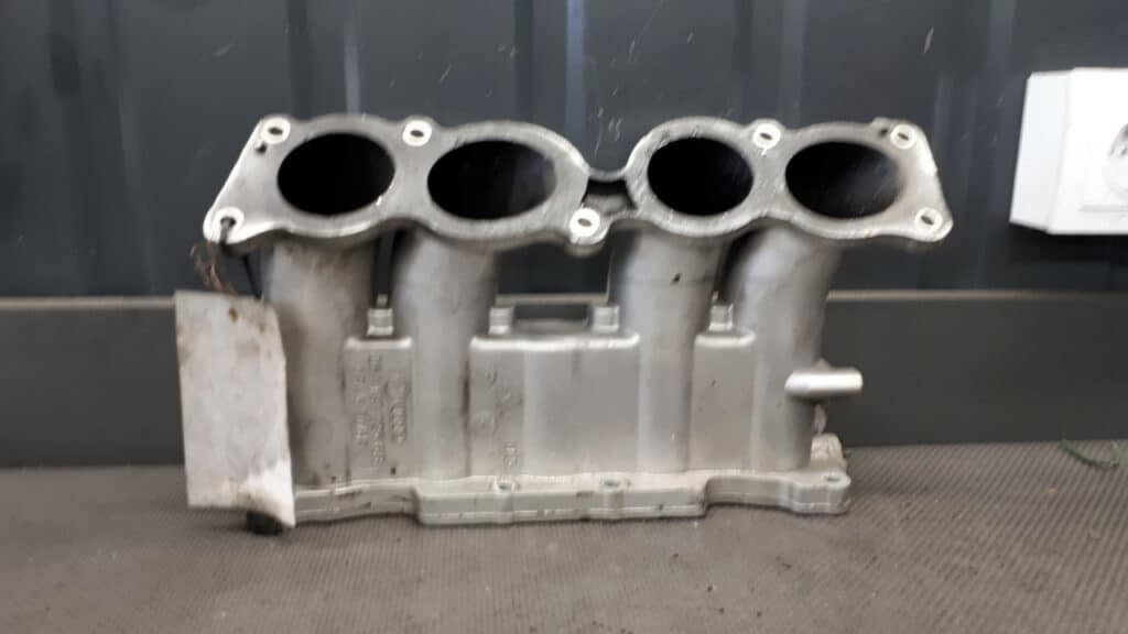 06A133925GB kolektor ssący audi a3 8p 1.8