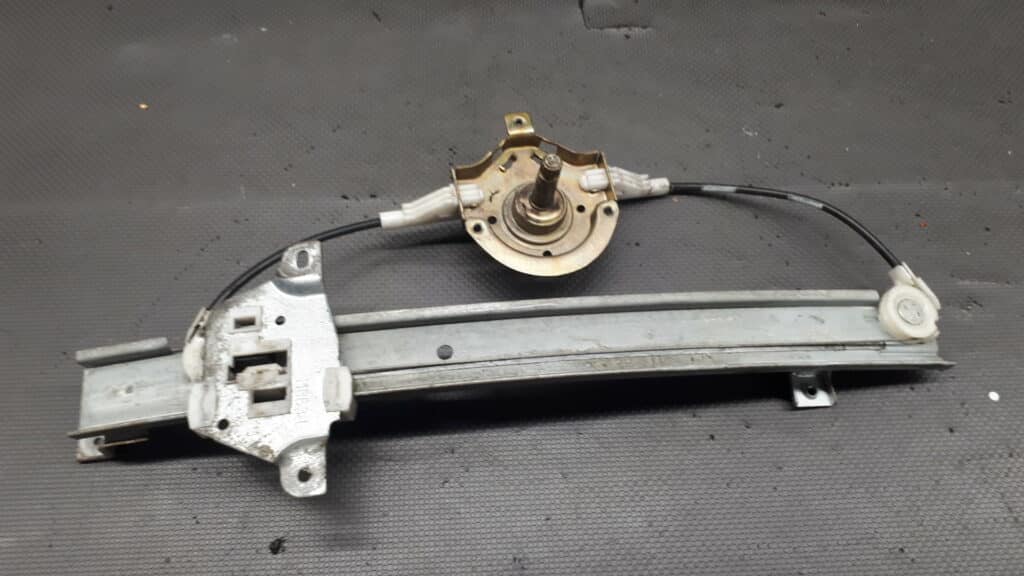 mechanizm szyby lewy tyl Mitsubishi Lancer VII