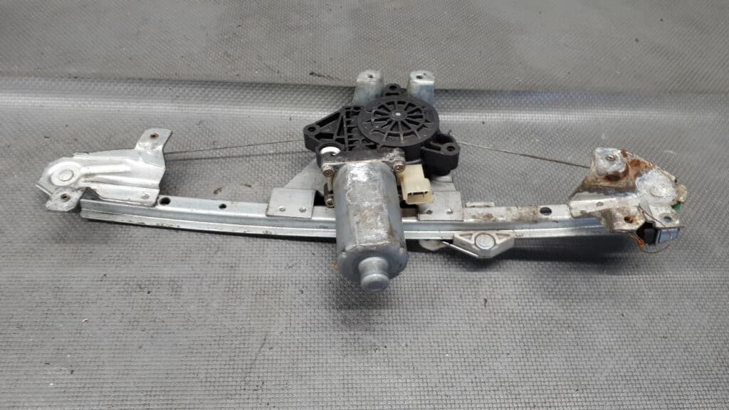 0130821665 mechanizm szyby lewy tył Saab 93r