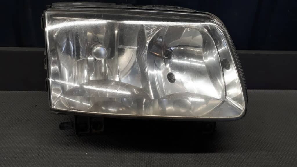 Reflektor lewy VW Polo 6N lift