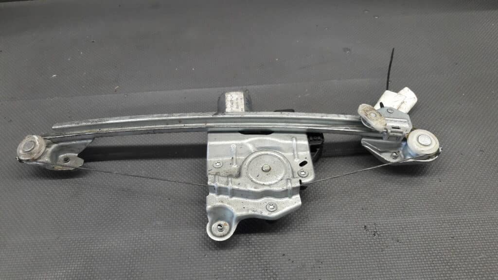 13100423 Mechanizm szyby lewy tył Opel Astra H