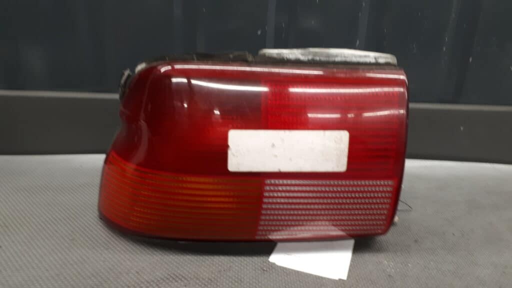 93AG13A603AA Lampa lewy tyl Ford Escort MK6 9R