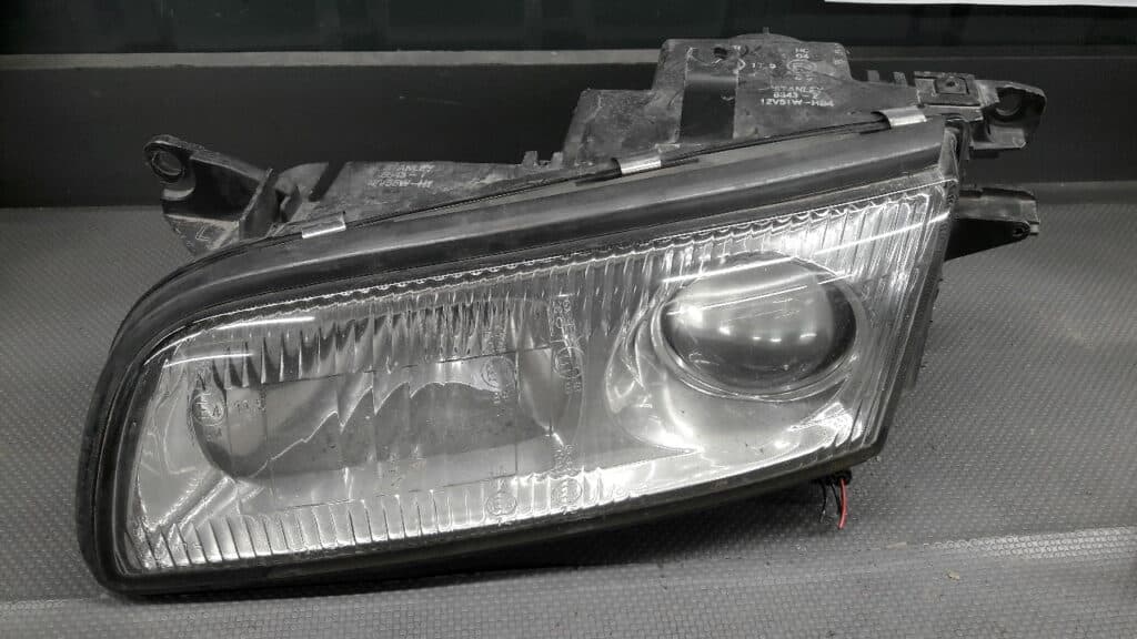 Reflektor lewy przód MAZDA XEDOS 9