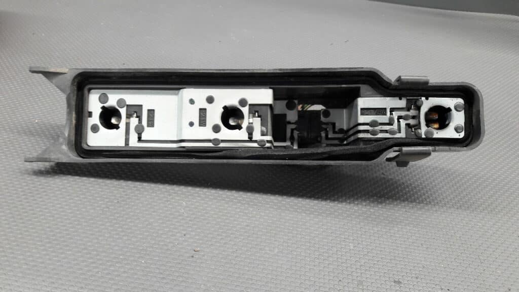XS4X13N004EC Wklad lampy lewy FOCUS MK1 kombi
