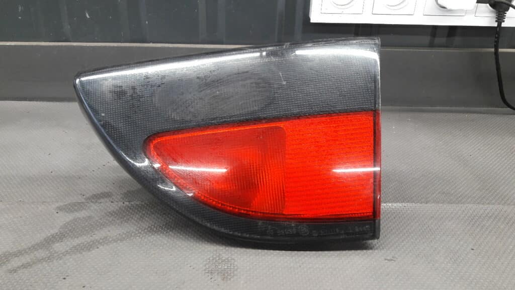 7700838533 Lampa lewy tył Renault Megane I Sedan