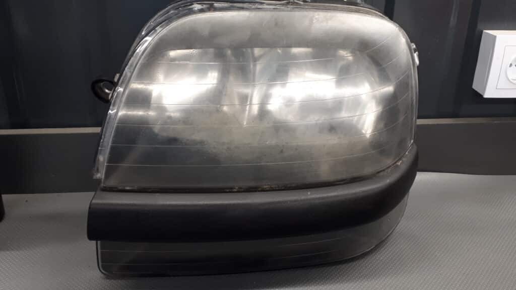 40555999 reflektor lewy Fiat Doblo I 00-10r