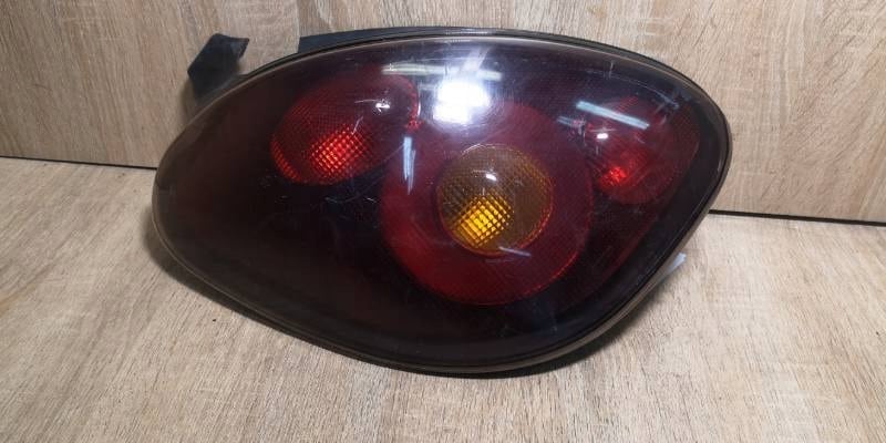 7779098 LAMPA LEWY TYL FIAT BRAVO I