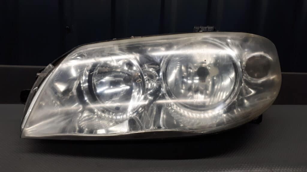 89101064-SX reflektor lewy FIAT PUNTO II EU