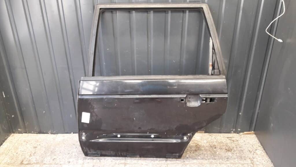drzwi lewy tył Passat B4 kombi czarne 94r