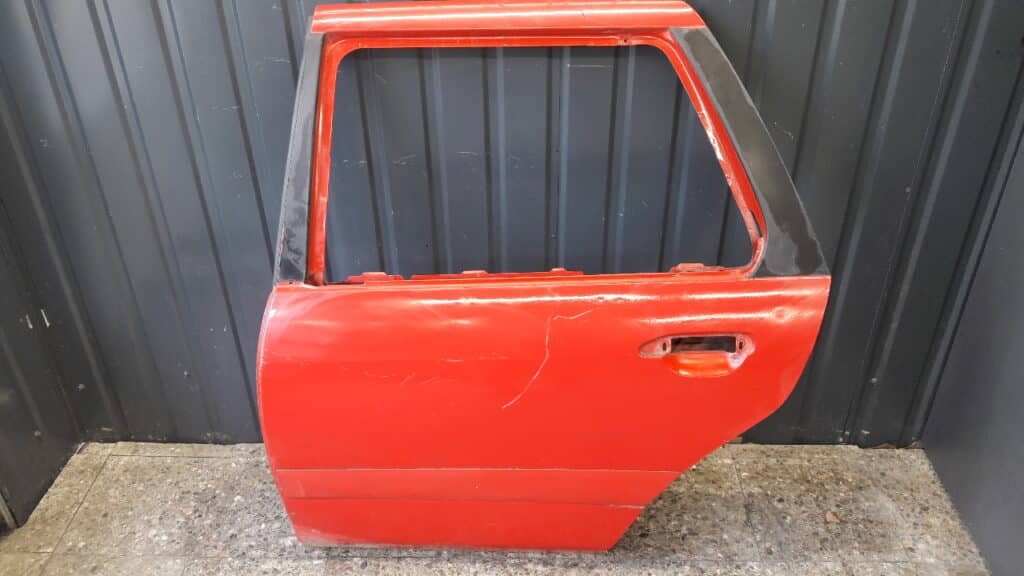 Drzwi lewy tył Nissan Primera P11 Czerwone