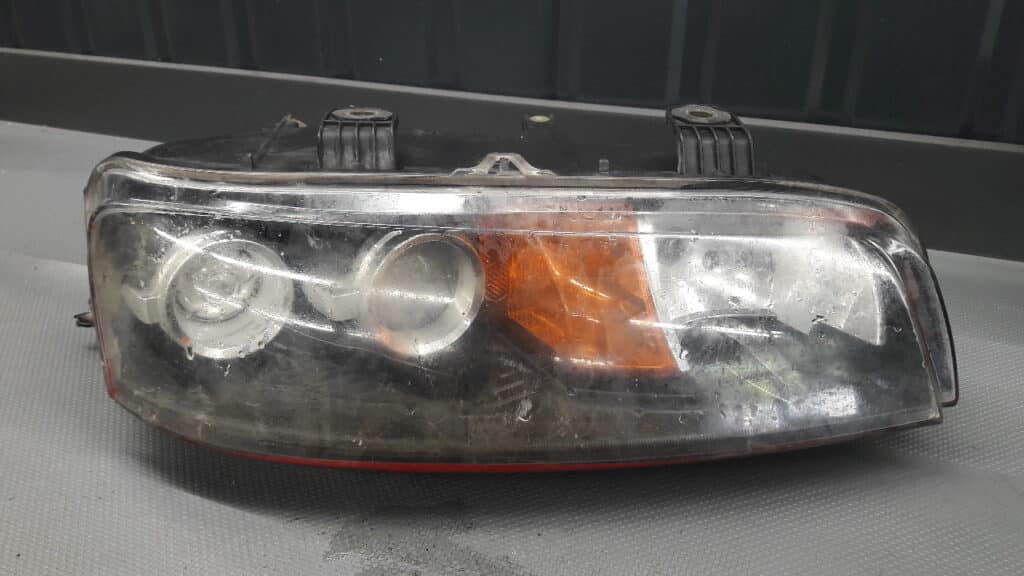 89100448 reflektor prawy fiat punto II