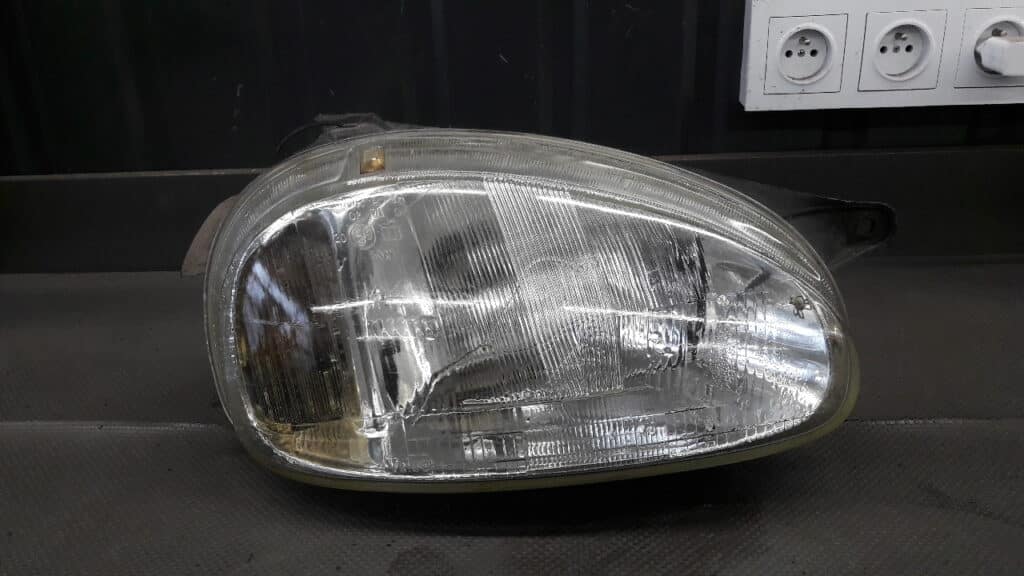 90444785 Reflektor prawy Opel Corsa B Valeo