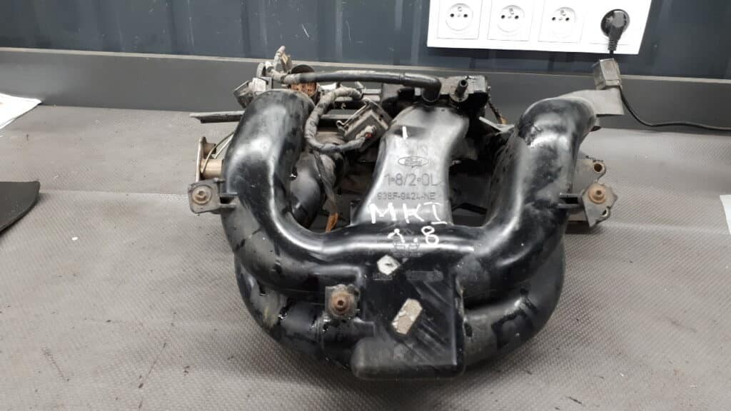 938F-9424-NE kolektor ssacy ford mondeo mk2 1.8