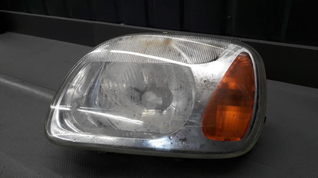 89004677 Reflektor lewy Nissan Micra K11