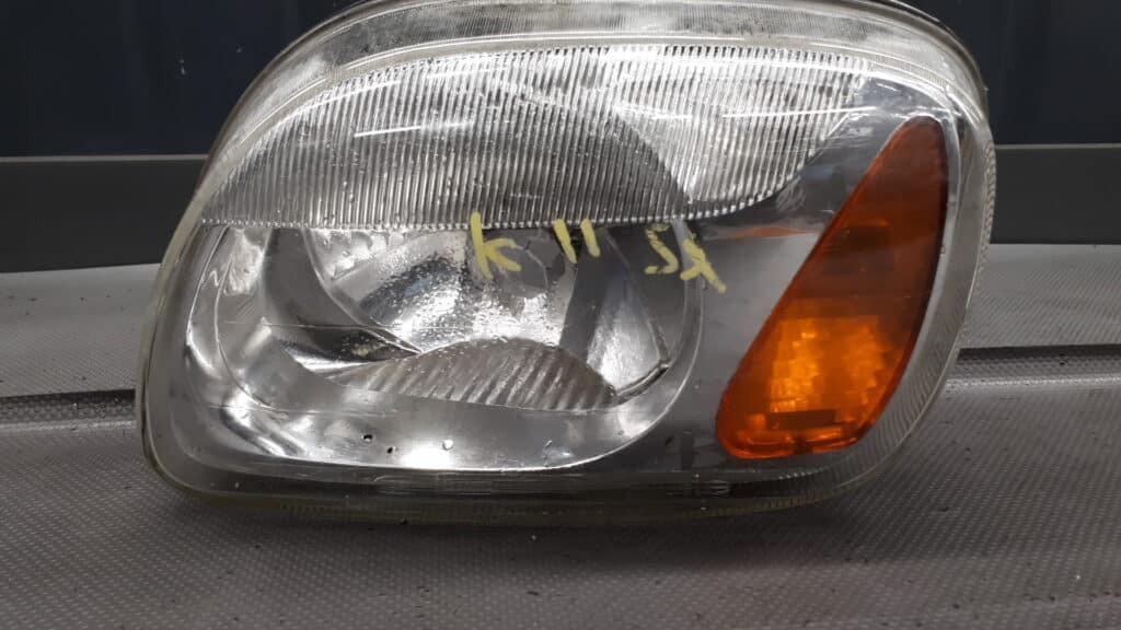 26061F511 reflektor lewy przod Micra K11 EU 98-03