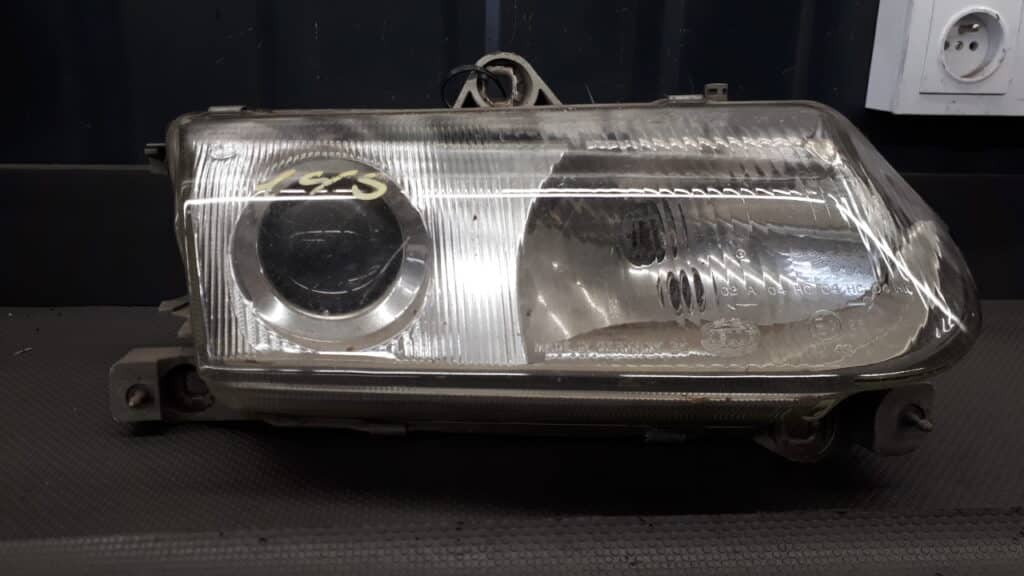143116-01 reflektor prawy alfa romeo 145 hella
