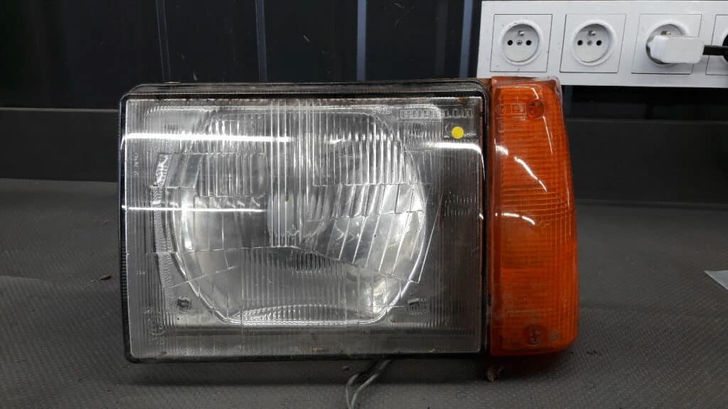 40370748 Reflektor lewy Fiat Panda I