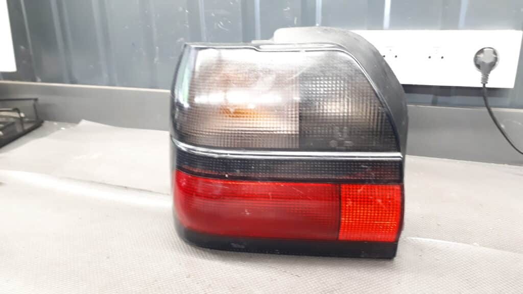 7700816015 lampa lewy tyl renault 19