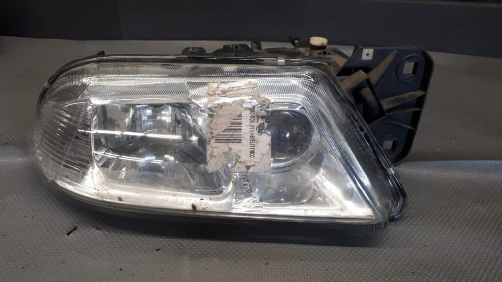 098-667-1112R reflektor prawy Alfa Romeo 166
