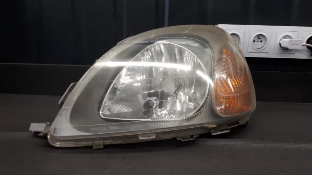 89008658 Reflektor lewy Toyota Yaris I Valeo