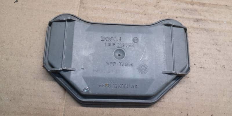 1305219059 Dekielek zaślepka lampy Ford Fiesta MK4