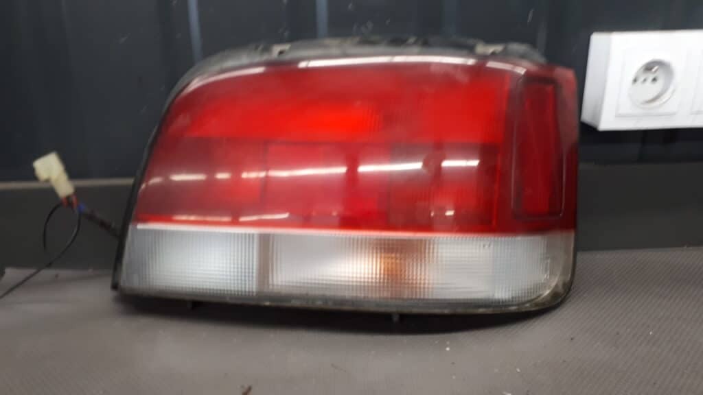 220-32018 lampa tył tylna suzuki baleno 95-02 h/b