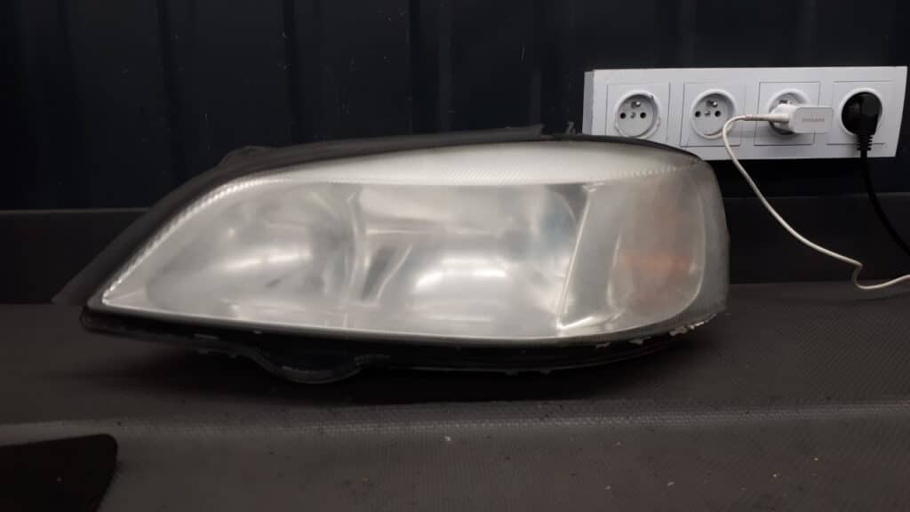 1eg00764031 reflektor lewy opel astra II