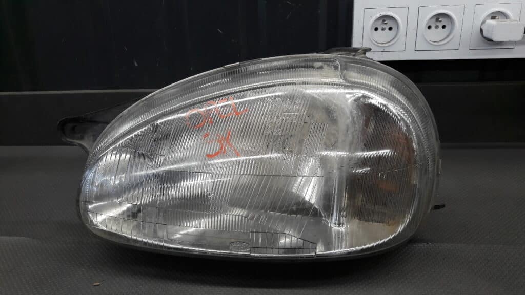 Reflektor lewy Opel Corsa B Marelli