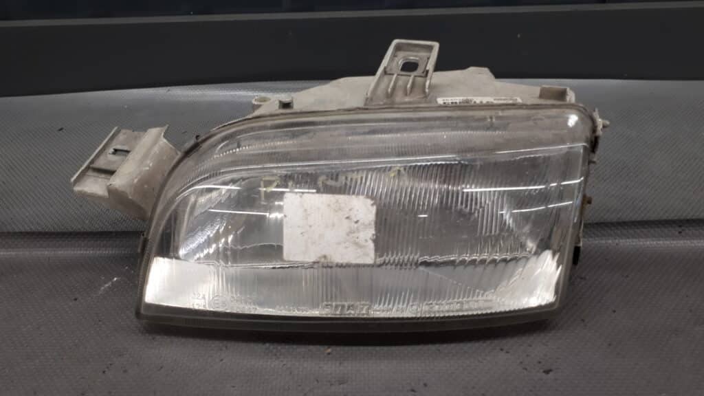 46402660 Reflektor lewy Fiat Punto I CARELLO