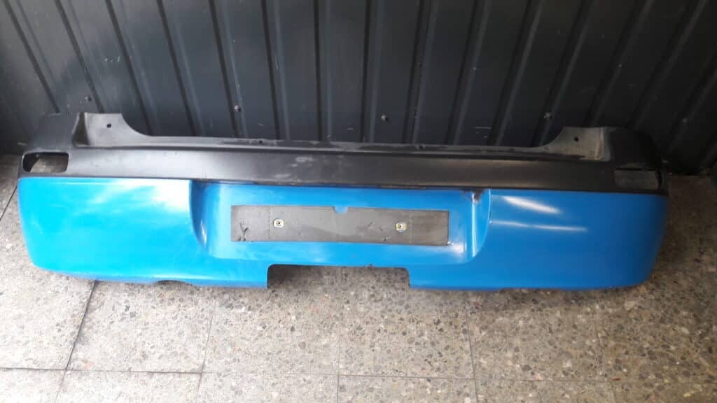 09116144 zderzak tyl Opel Corsa C niebieski
