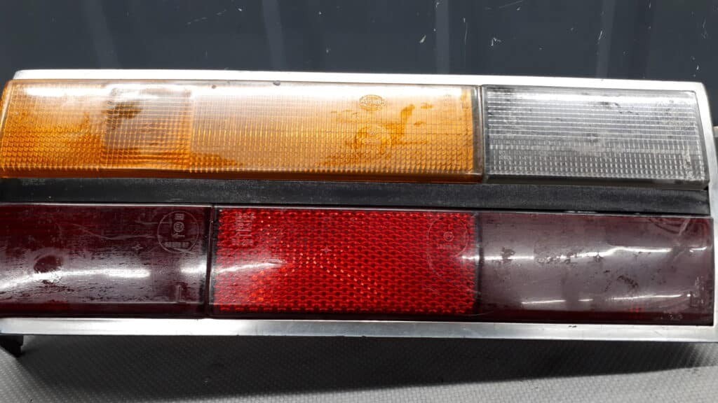 lampa lewy tyl Audi 100 kombi hella 79
